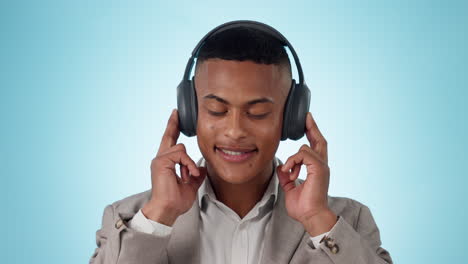 headphones, move and young businessman in a studio