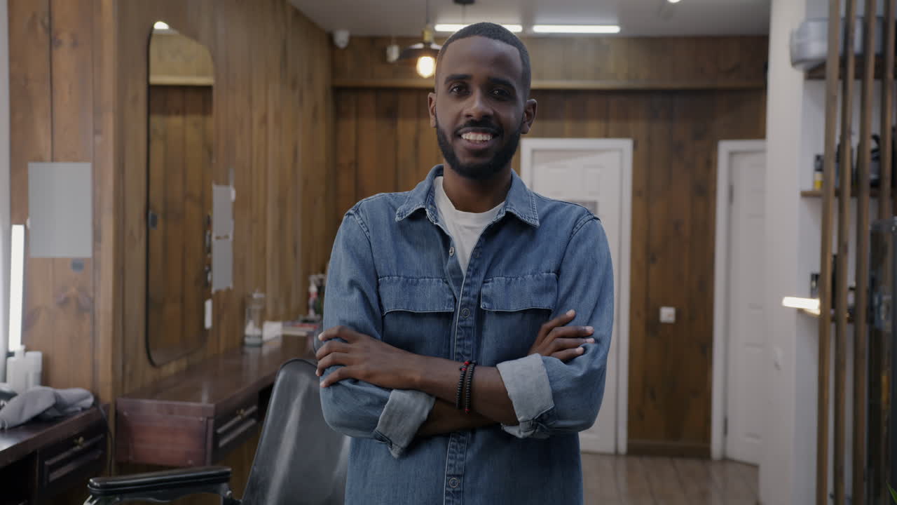 Confident Barber in Modern Salon