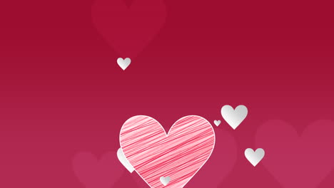 Animated-closeup-romantic-red-big-and-small-hearts-on-red-Valentines-day-background.