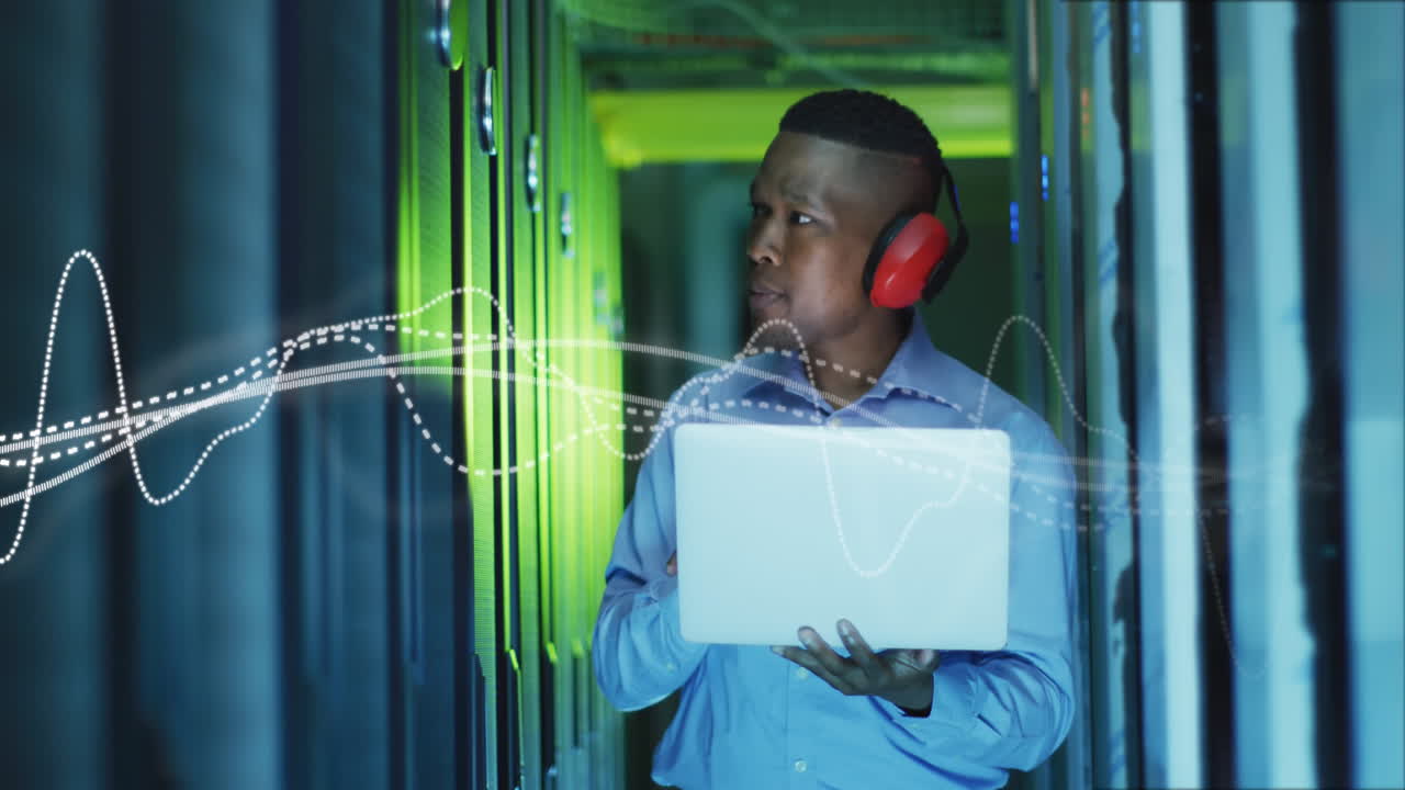 Animation of data processing over african american male it engineer and computer servers
