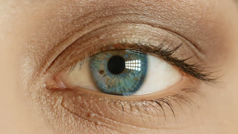 close up macro blue eye opening beautiful iris natural human beauty healthy eyesight concept