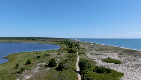 Aerial-view-of-waterlands-,-ocean-and-walking-path-through-national-research-reserve