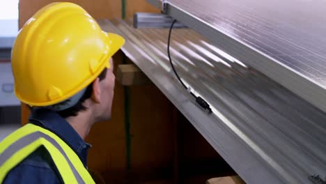 male worker working on solar panel 4k