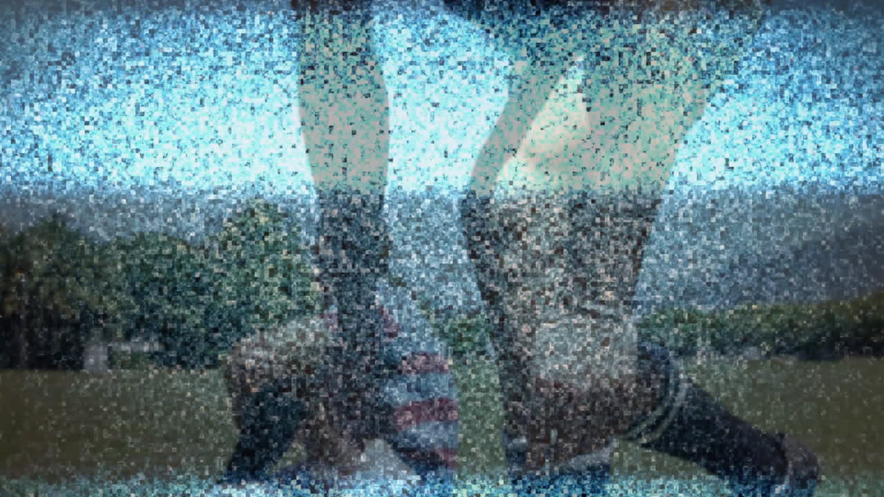 Graphic designers exploring glitchy technology interface, with animated floating pixel icons