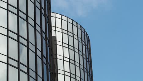 time lapse clouds and reflecting glass towers 4k