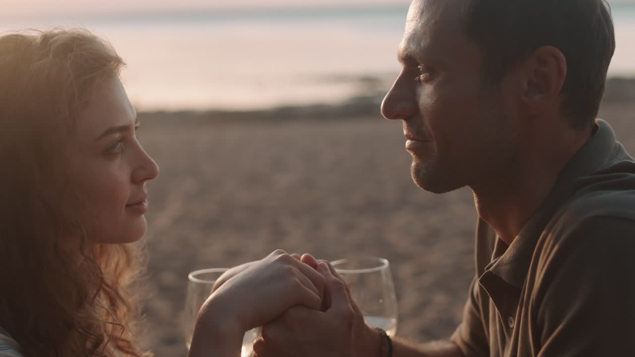 Loving Couple on Sunset on Sea