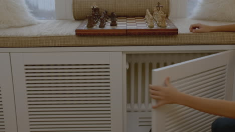 child playing chess at home