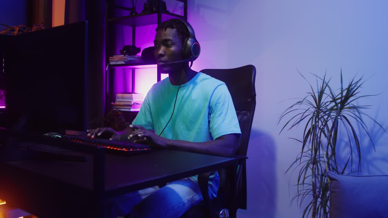 Man playing video games at home