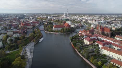 flying over cathedral island towards sand island on the river odra in wroclaw poland