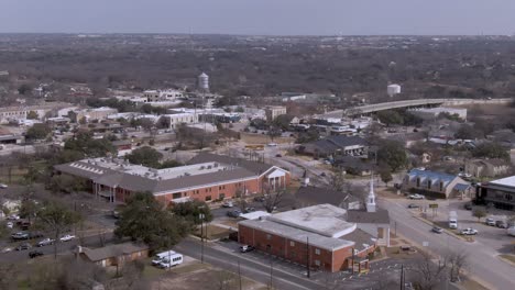 aerial pan up of downtown round rock, texas on a sunny day