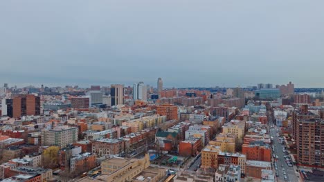 Super-wide-4K-drone-over-residential-Harlem-in-New-York-City