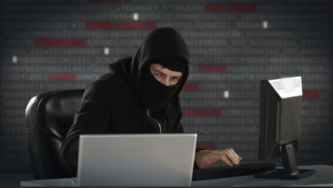 Composite-Video-Eines-Hackers,-Der-Einen-Laptop-Benutzt