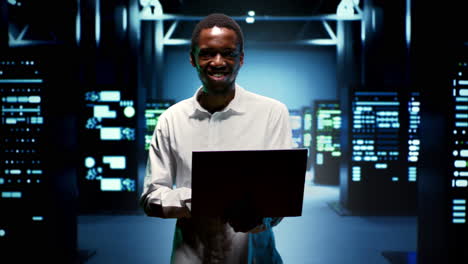 computer expert walking between servers