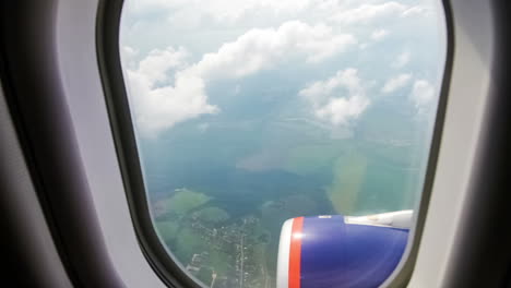 view from the airplane window at the clouds