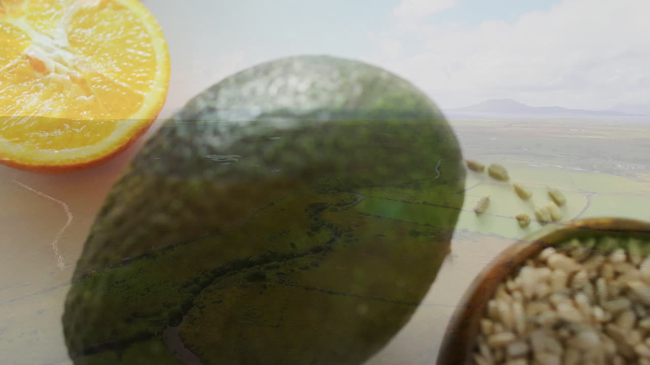 Avocado and orange with grains and seeds, creating healthy food animation