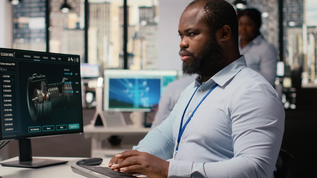 Engineer In Office Works On Wind Turbine Cad Design, Sustainable Energy Research