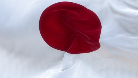 pantalla completa la bandera japonesa está ondeando lentamente
