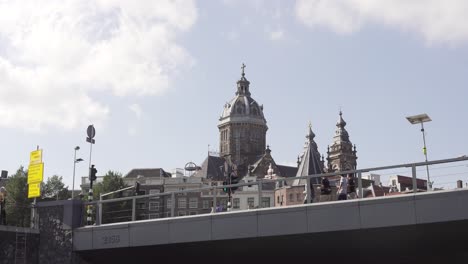 famous basilica of saint nicholas shot from boat cruise in amsterdam