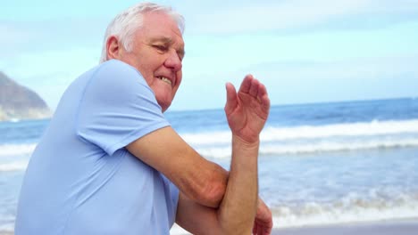 Senior-man-performing-stretching-exercise