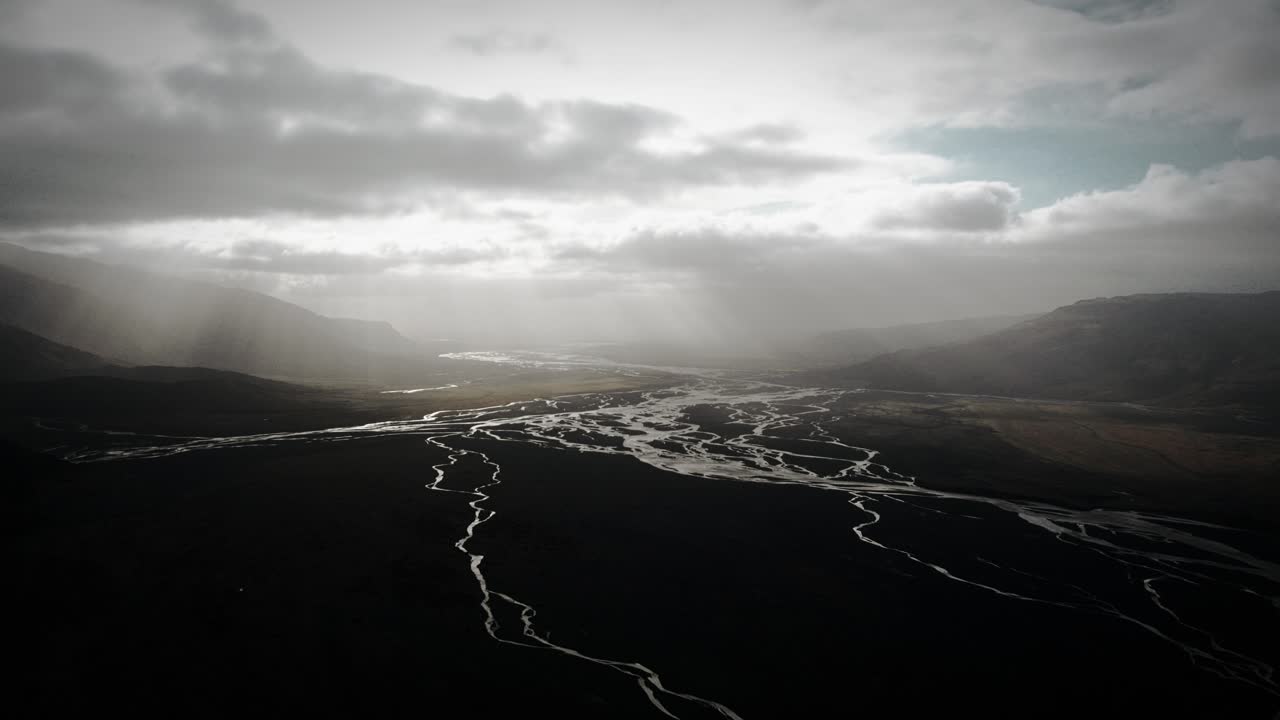 aerial thor valley, glacial river flowing through black volcanic floodplain, thorsm&ouml;rk dramatic scenery moody landscape Iceland