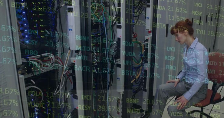 IT Technician Monitoring Server Rack with Digital Data Overlay