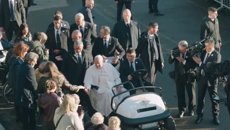 pope francis meeting people in popemobile - louvain-la-neuve, belgium - close shot