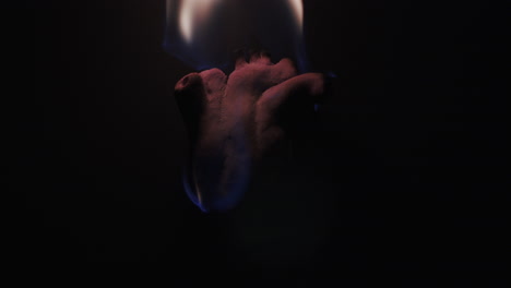 slow motion closeup of an anatomically correct heart on fire