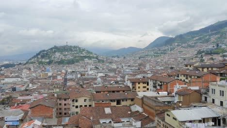 Panning-across-Epic-city-of-Quito-Ecuador-with-El-Panecillo-"La-Virgen-del-Panecillo"-in-background