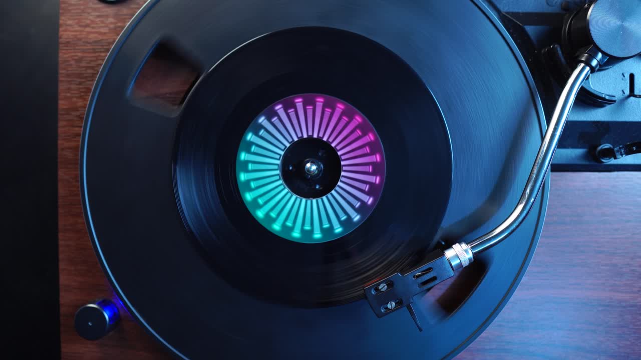 Starting Playback of Single 45 RPM Vinyl Record on Turntable, Top Down View