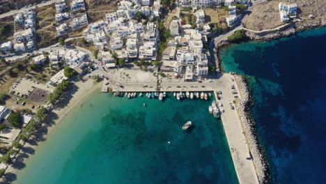 aegiali village port on amorgos island, revealing drone shot