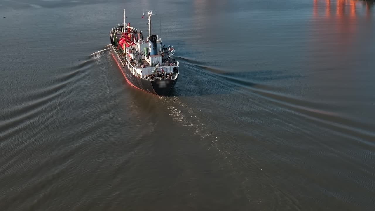 Aerial view of a ship navigating the waters of Bangkok in Thailand