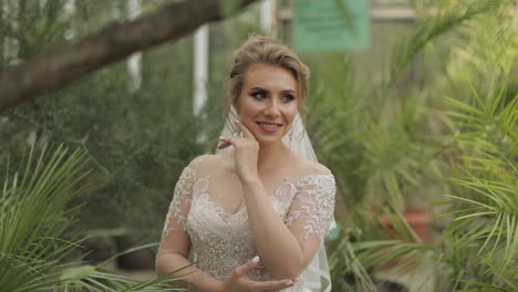 beautiful bride in a wedding dress in a garden