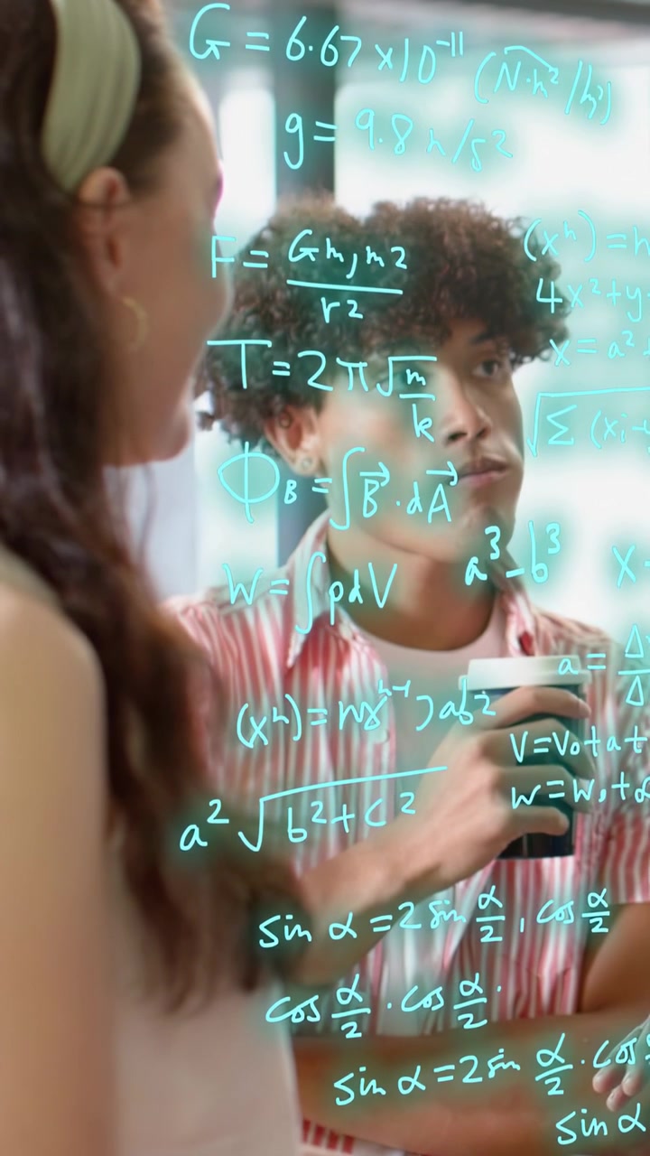 Vertical video: Male student holding cup woman coming talking math filling over him aiding study