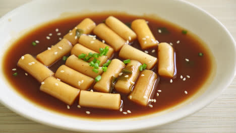 spicy jjajang tteokbokki or korean rice cake in spicy black bean sauce - korean food style