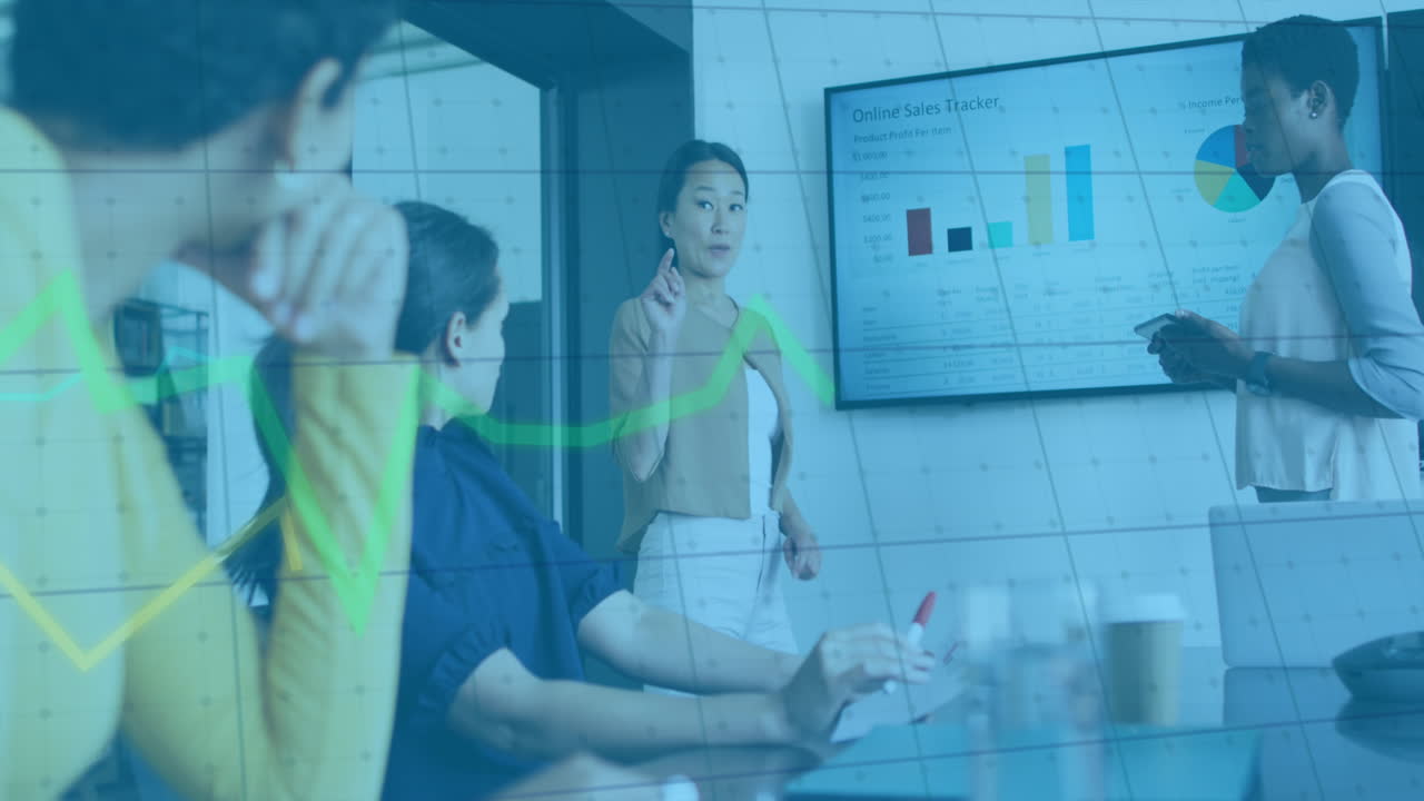 Animation of data processing over diverse business people at meeting in office