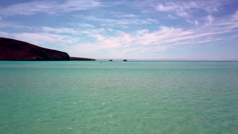 panoramic aerial shot of balandra beach with yachts anchored in the bay, baja california sur, mexico