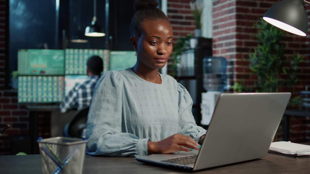 Business investor working at night to plan forex money exchange