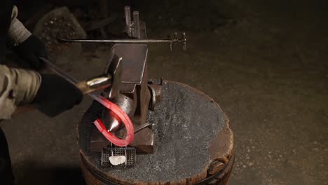 blacksmith working on a horseshoe