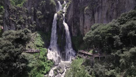 touristic waterfall attraction: aerial drone view of nature's splendor in puebla, mexico