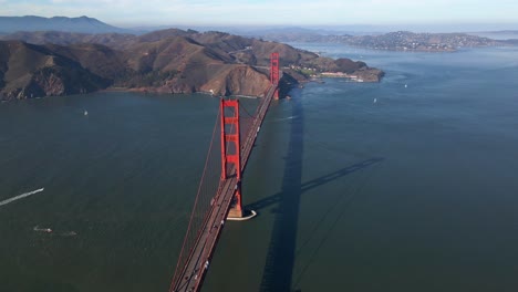 aerial view of the golden gate bridge, sunny fall day in ca, usa - rotating, pull back, drone shot