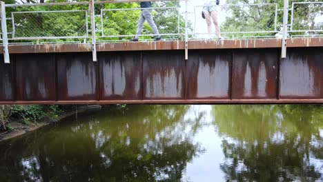 Aerial-still-of-a-rusting-old-bridge