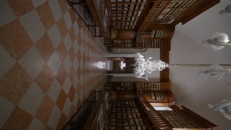 Biblioteca-Teresiana-Mantova-|-Old-library-with-hanging-crystal-chandeliers