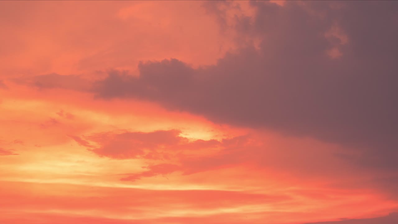 Breathtaking colorful sunset, Cloudy sky changing colors. Day to night timelapse