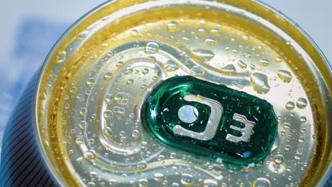 aluminum soda tin can lid cover of soft drink on ice goes around the circle.