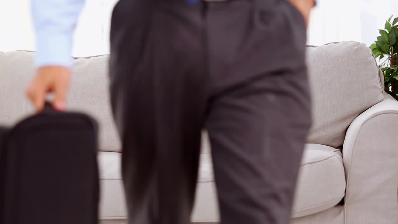 Businessman calling and going out 