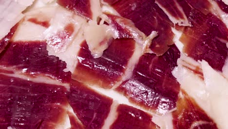 extreme closeup of sliced jamon iberico, gourmet spanish cured ham