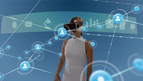 Animation-of-network-of-connections-with-icons-over-businesswoman-wearing-vr-headset