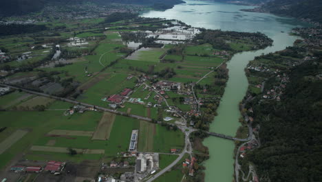 aerial perspective of the beautiful city and tranquil river of como lake, italy