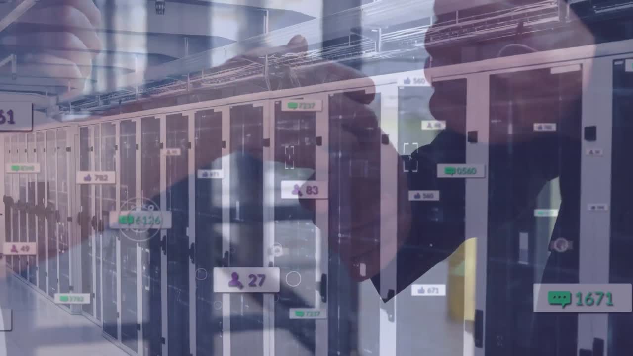 Animation of businessman handshake over social media icons and computer servers