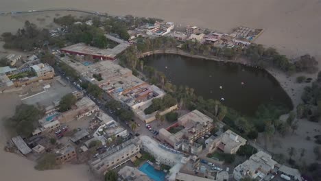 4K-aerial-shot-of-Huacachina,-Peru